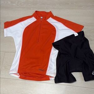 Orange and White Cycling Jersey with Black Shorts
